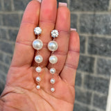 Orecchini pendenti con perle